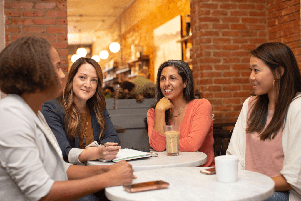 women having a meeting over coffee
