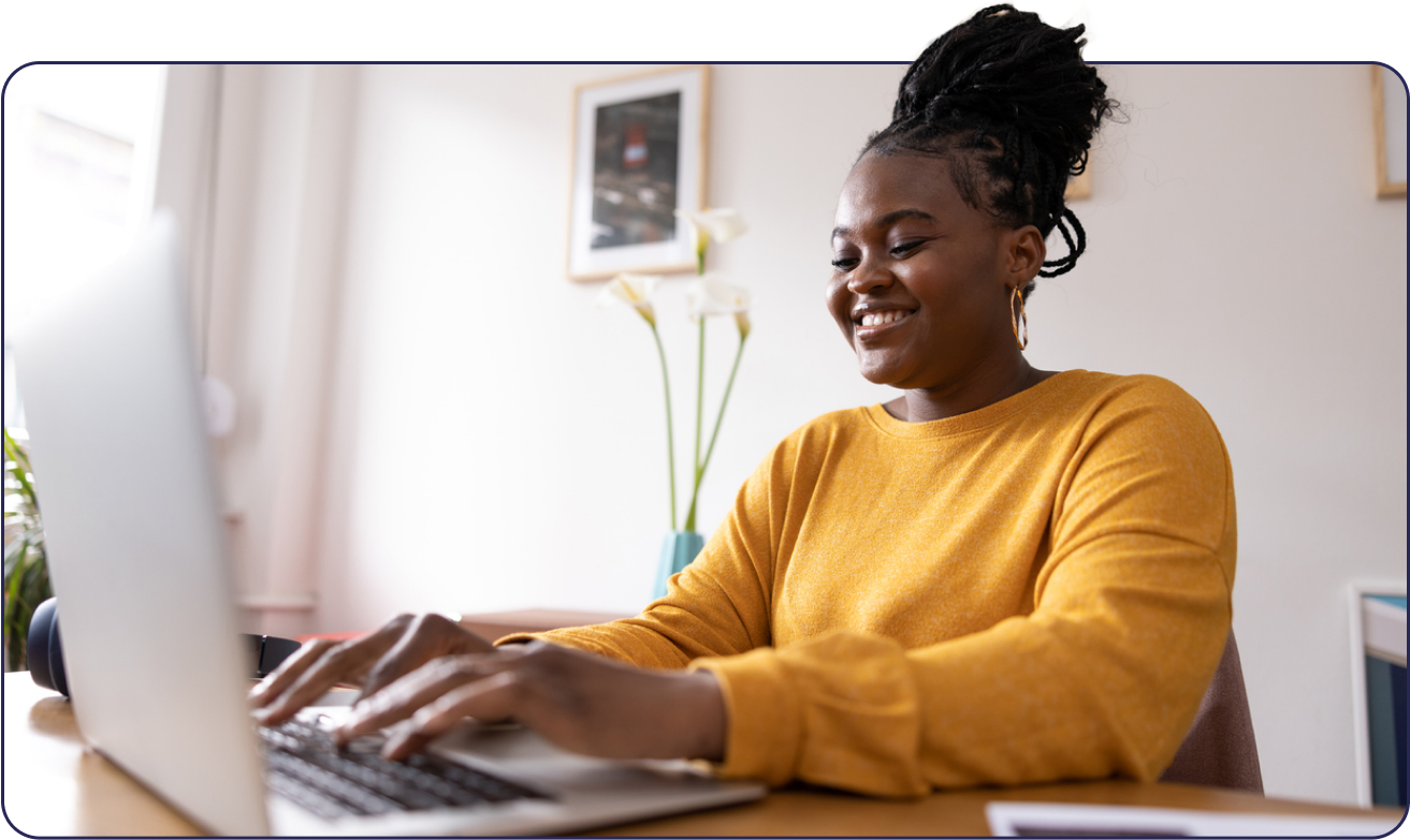 Happy Woman Typing Desktop