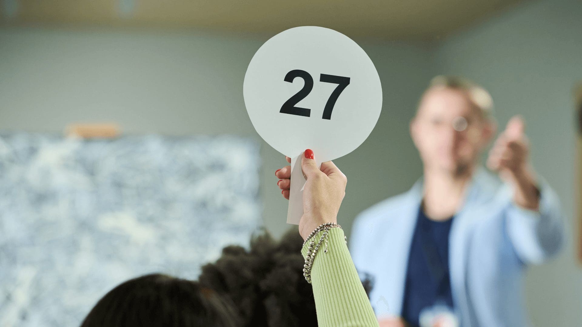 Have volunteers record paddle numbers