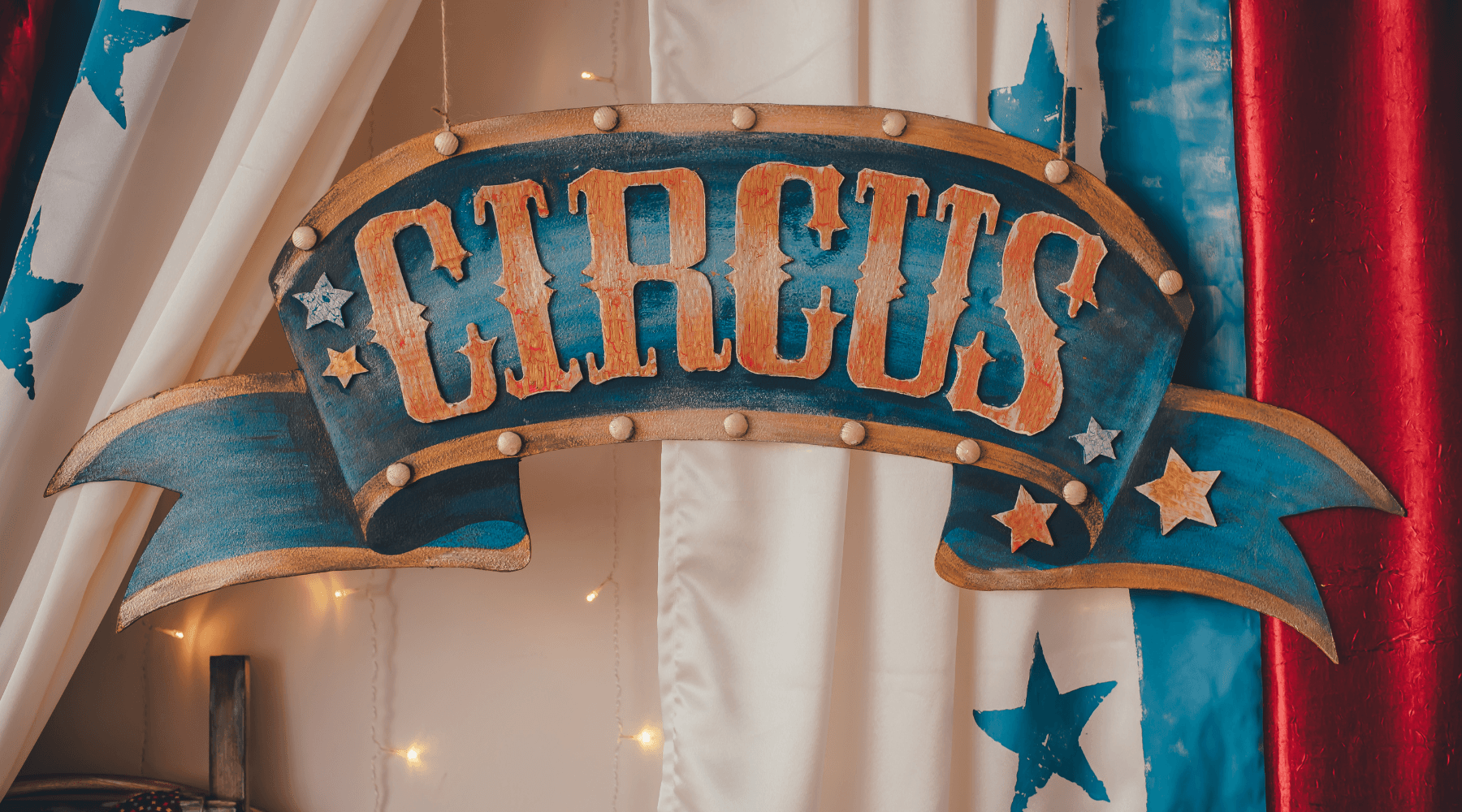 circus-themed carnival with game booths